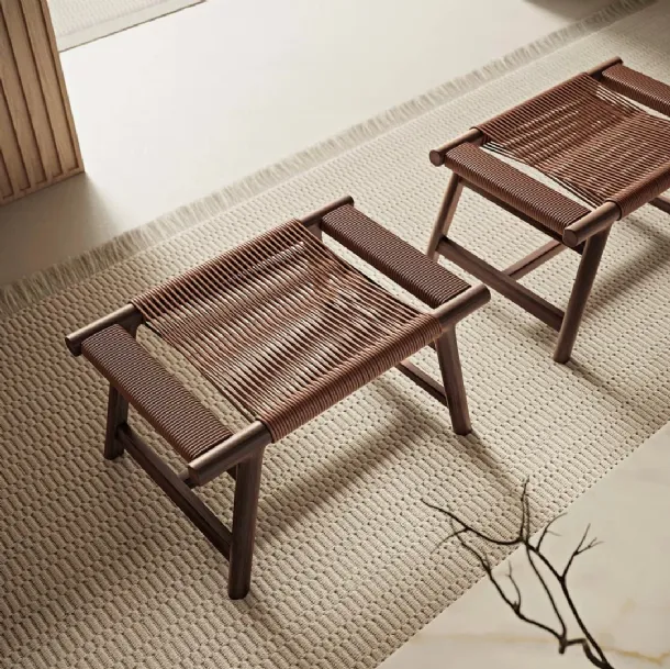 Giano Pouf in braided leather with solid wood structure by Flexform