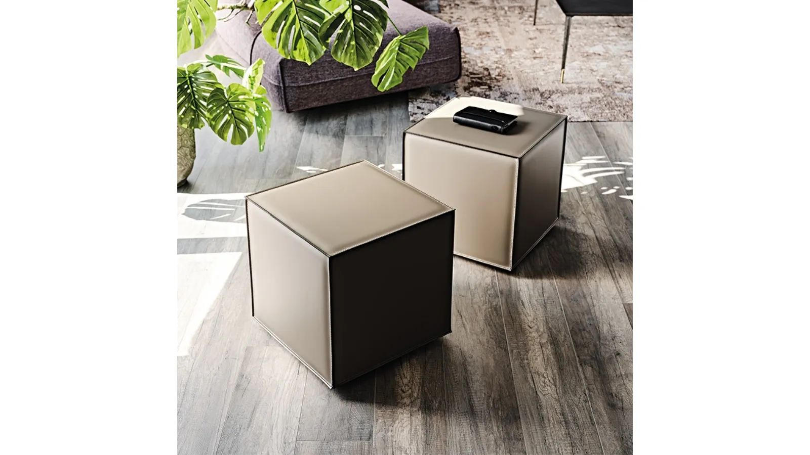 Kubo pouf on wheels fully upholstered in leather with contrasting stitching by Cattelan Italia