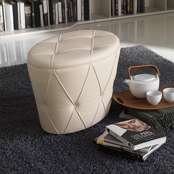 Pinko upholstered pouf with capitonné finish in faux leather by Cattelan Italia