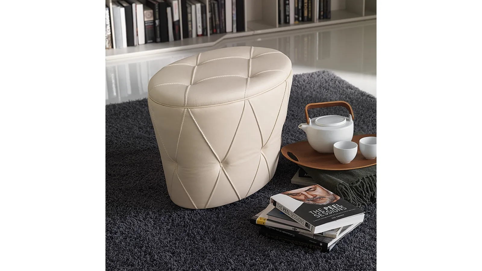 Pinko upholstered pouf with capitonné finish in faux leather by Cattelan Italia
