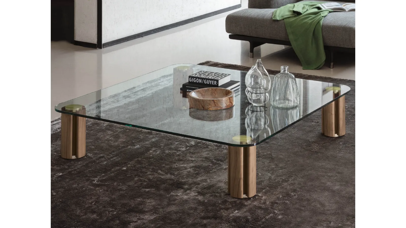 Low square coffee table with transparent Quadrifoglio glass top by Porada