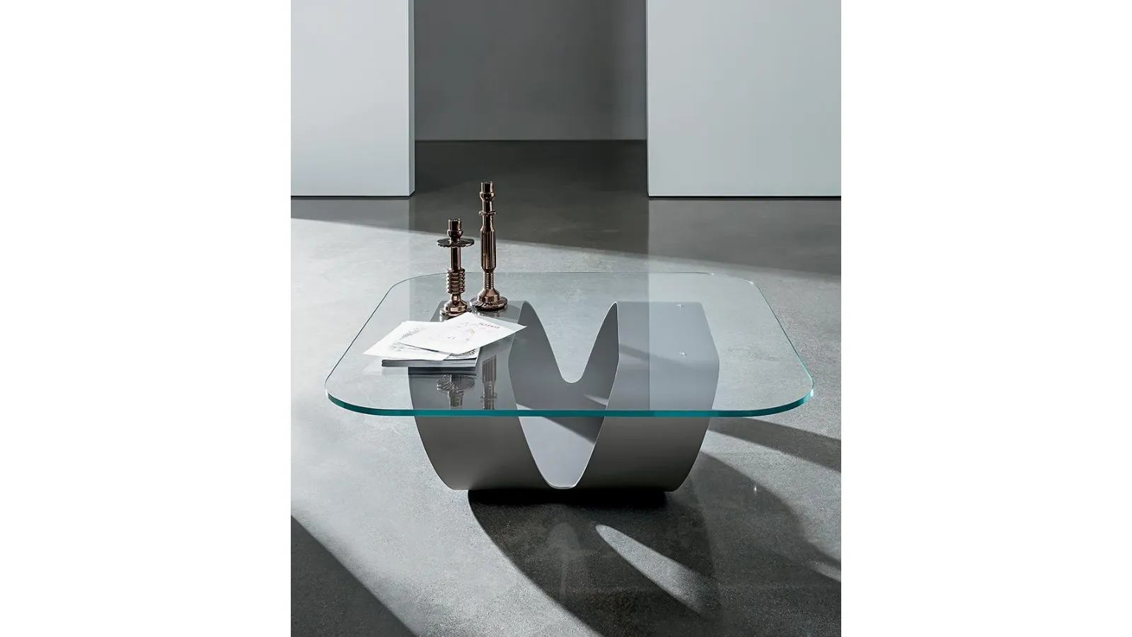Ring design coffee table with glass top and curved metal sheet structure by Sovet