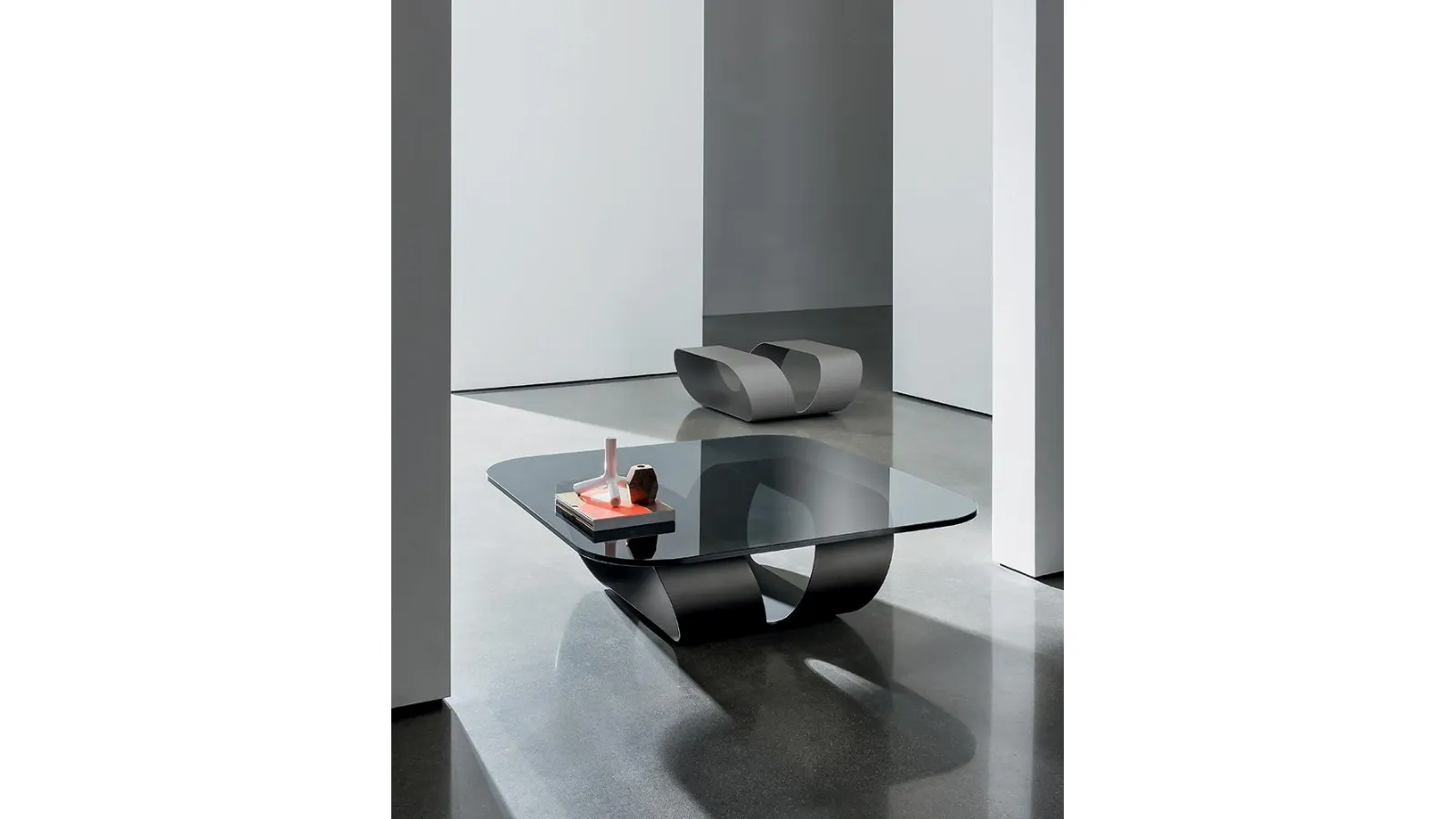 Ring design coffee table with glass top and curved metal sheet structure by Sovet