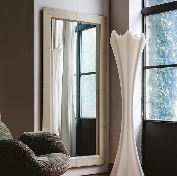 Mirror with leather frame Photo by Cattelan Italia