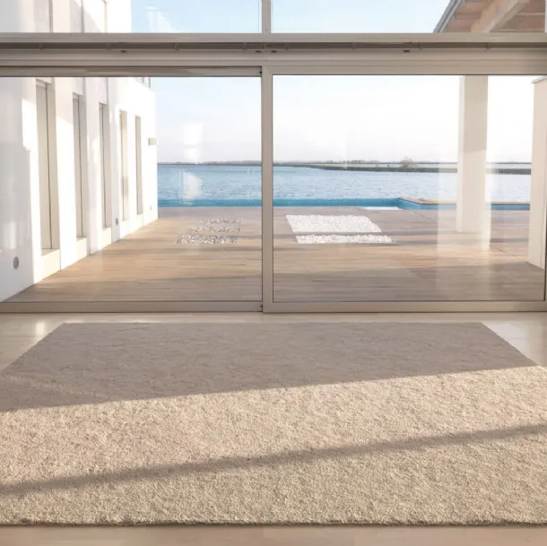 Solid color Baobab wool and linen fabric rug by Desirèe