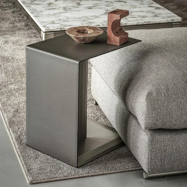 Plain metal coffee table upholstered in leather by Flexform