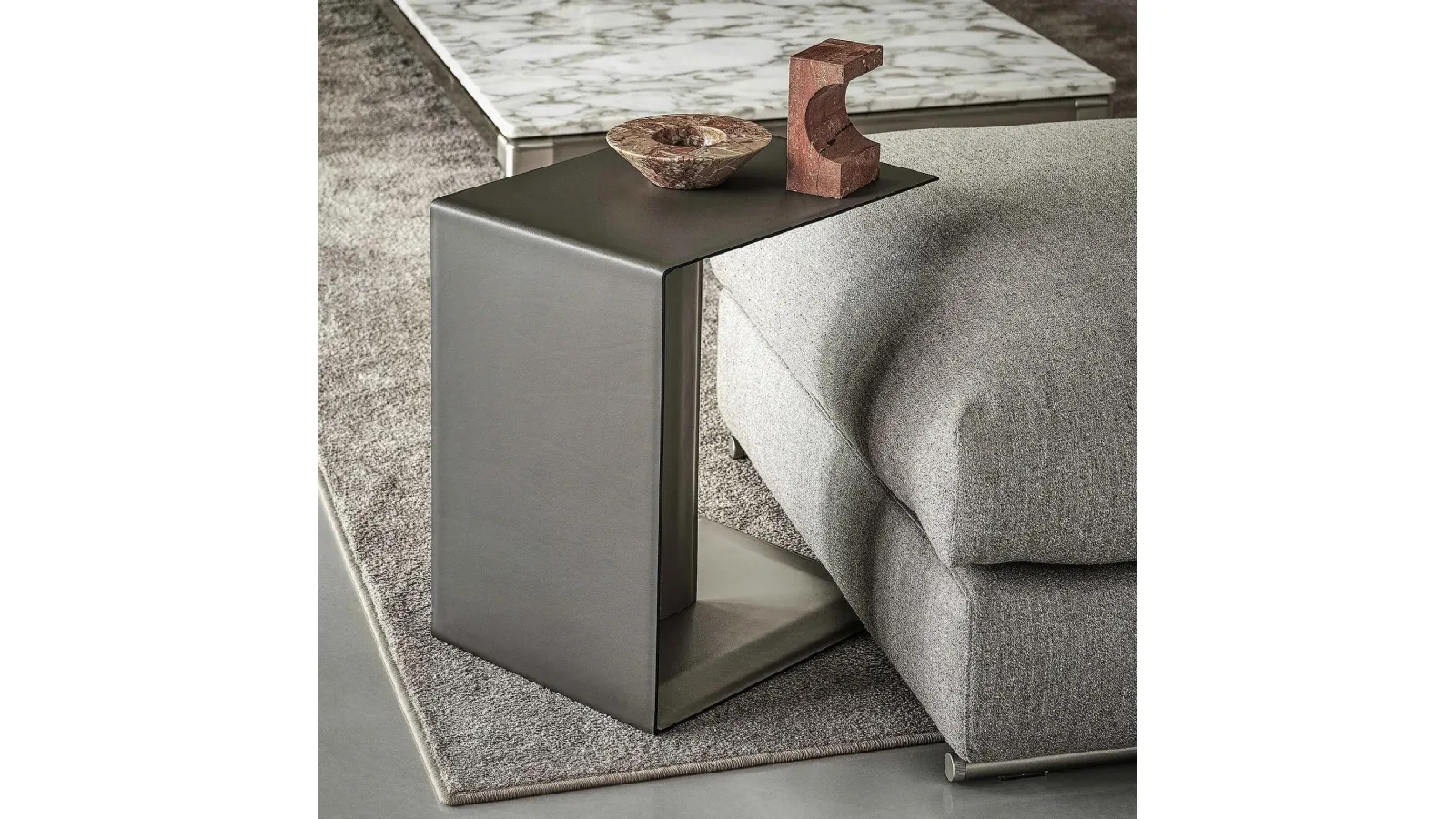 Plain metal coffee table upholstered in leather by Flexform