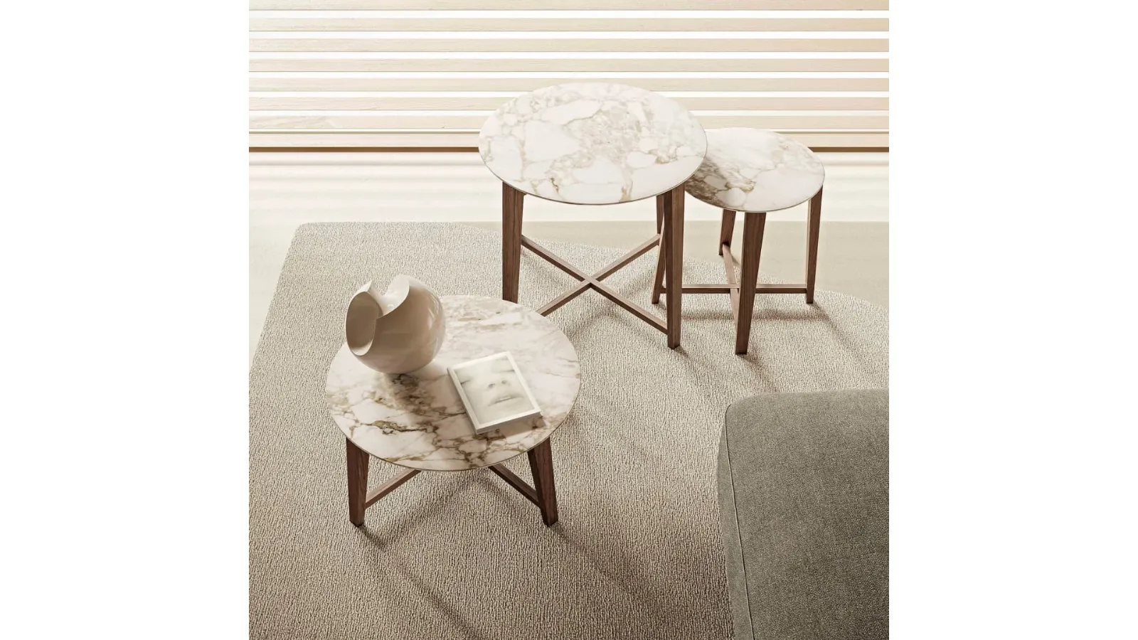 Tris round marble coffee table by Flexform