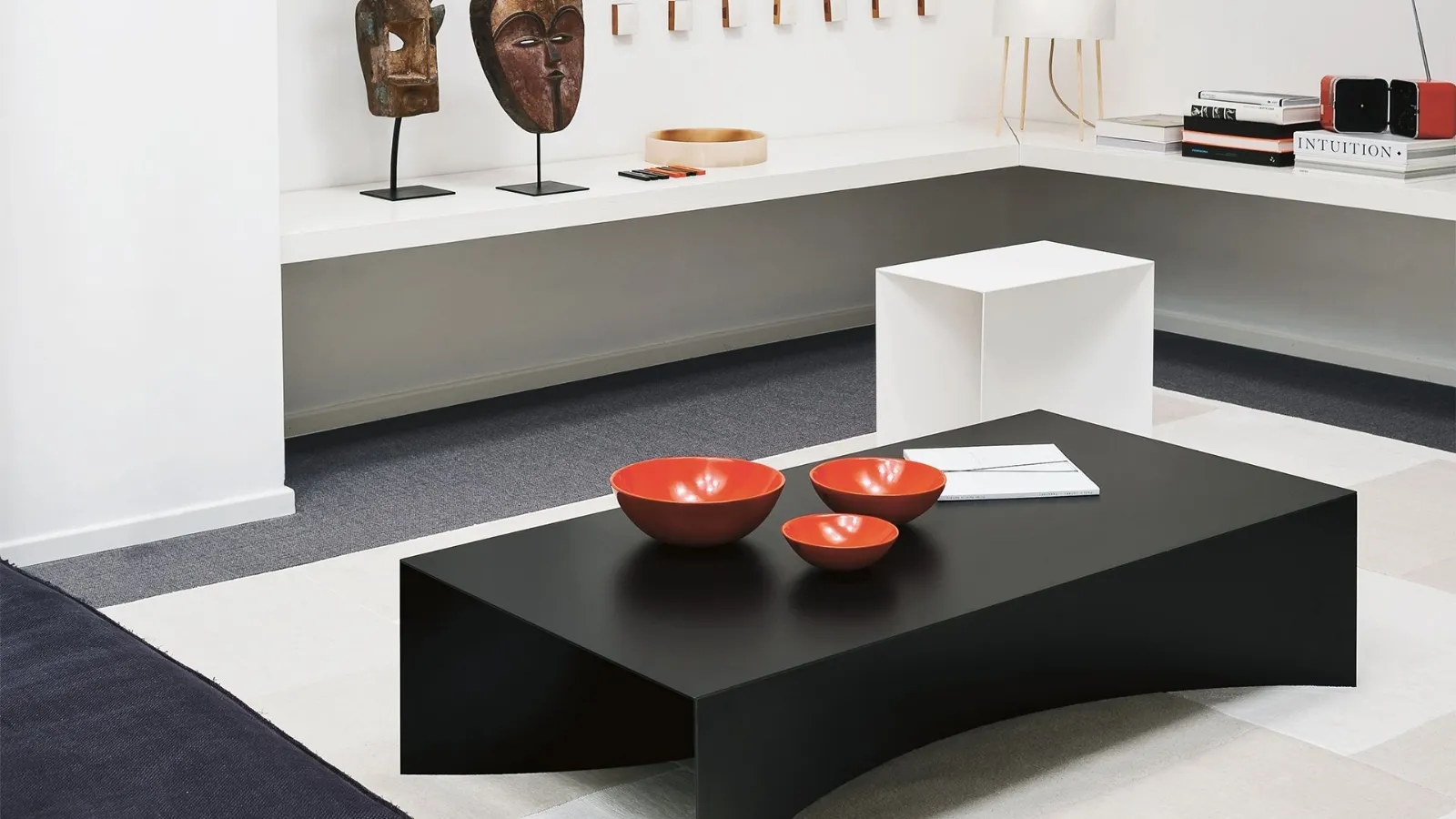 Void side table in black or white lacquered steel sheet by Desalto