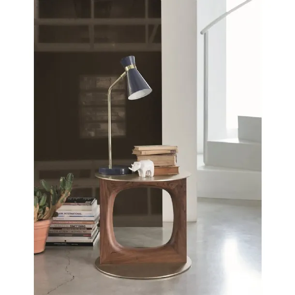 Design coffee table with a central support in solid Canaletto walnut and a metal top and base with brushed Tenco brass finish by Porada