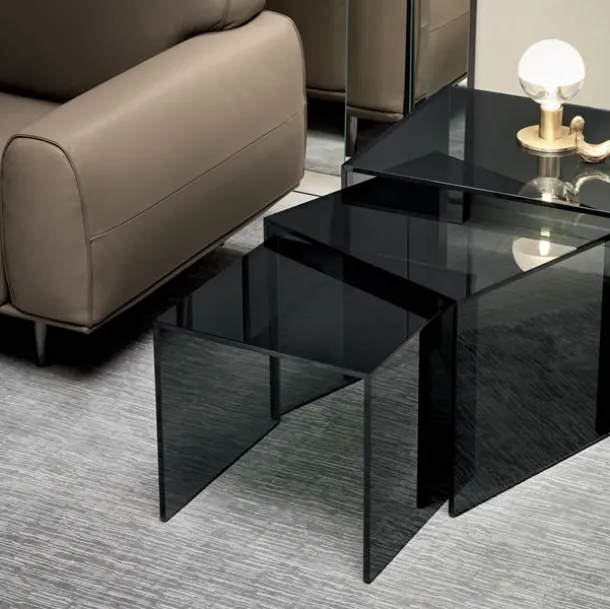 Trio coffee table set with glass bridge structures by Tonelli
