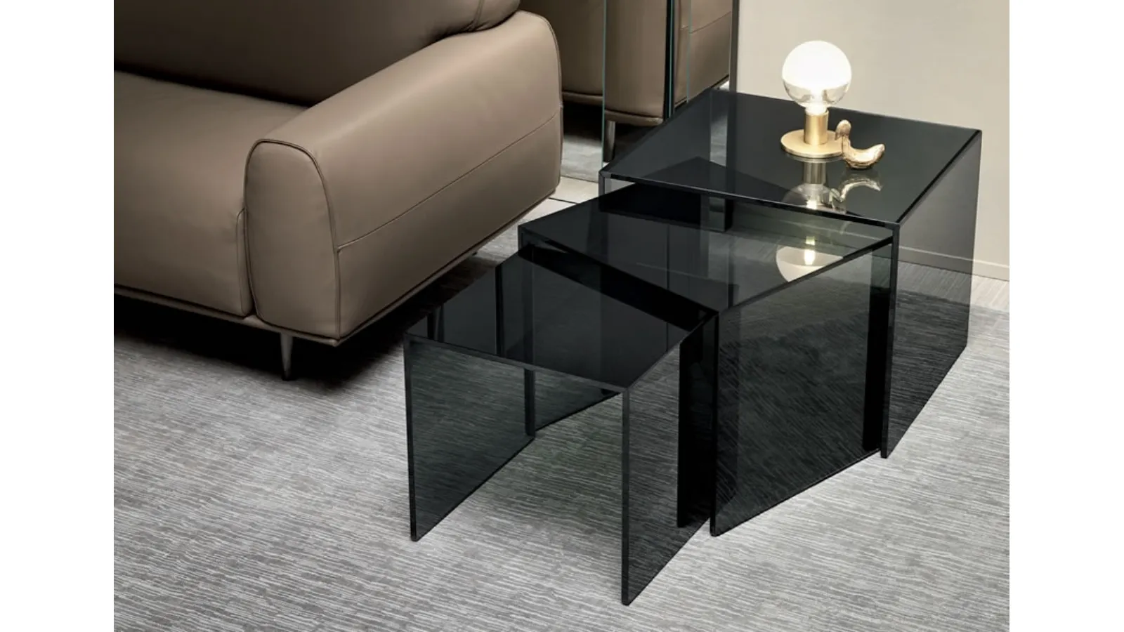 Trio coffee table set with glass bridge structures by Tonelli