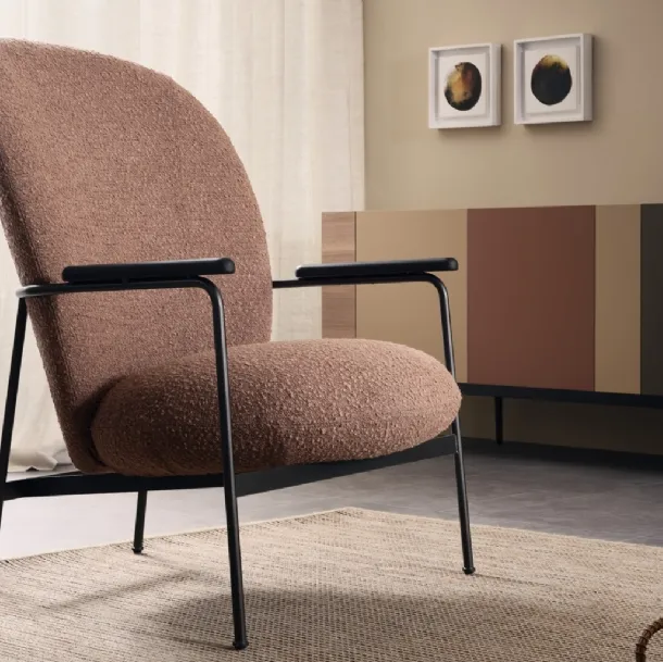 Claire upholstered armchair by Lema