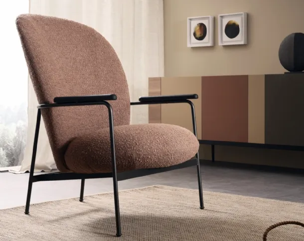 Claire upholstered armchair by Lema