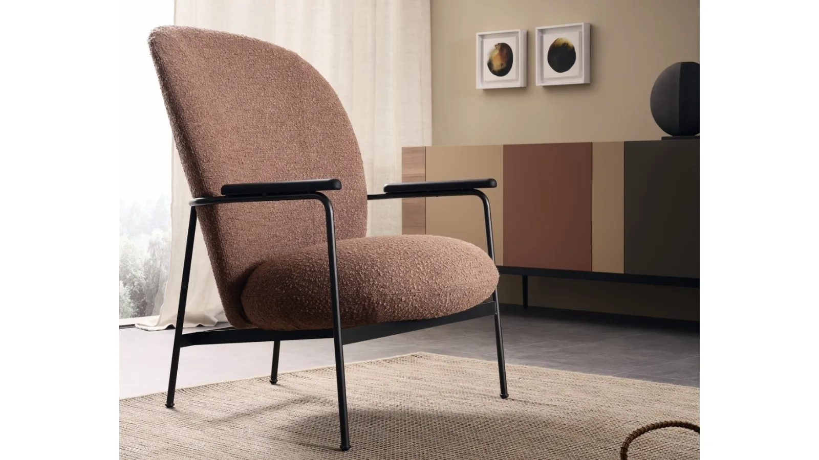 Claire upholstered armchair by Lema
