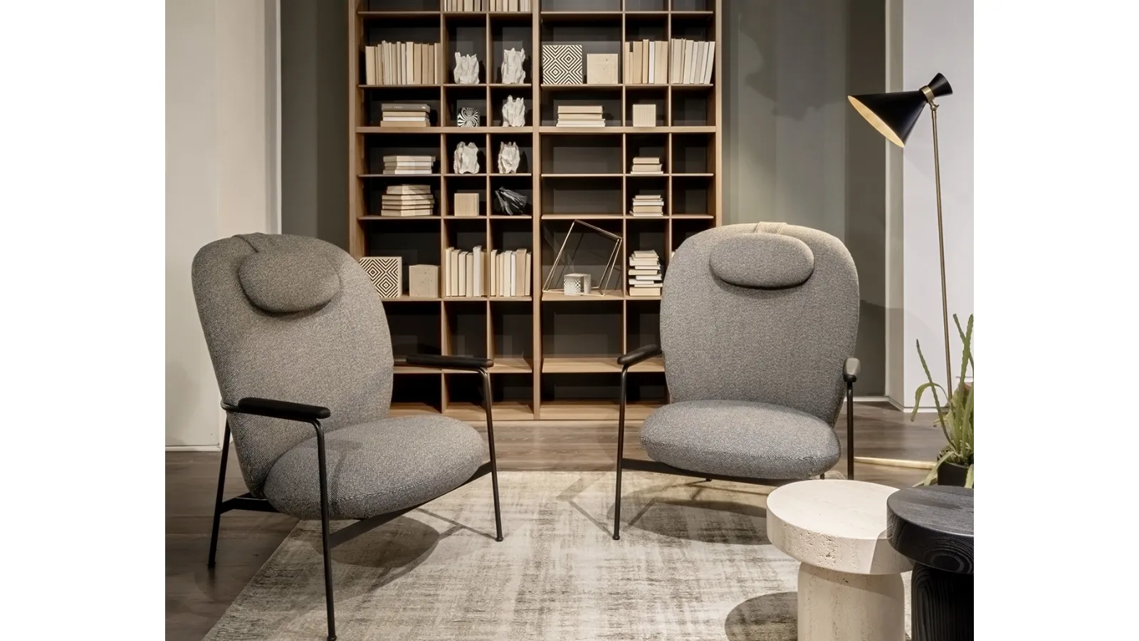Claire upholstered armchair by Lema