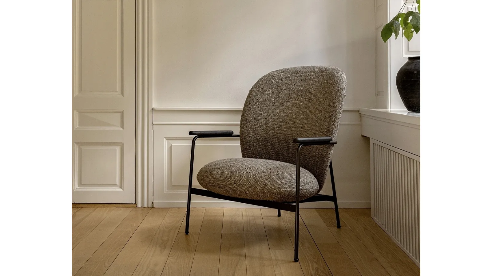 Claire upholstered armchair by Lema