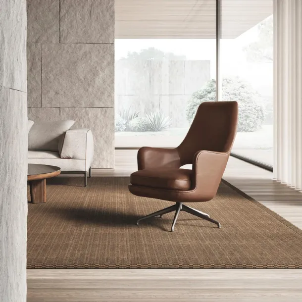 Eliseo leather armchair with a swivel aluminum base by Flexform