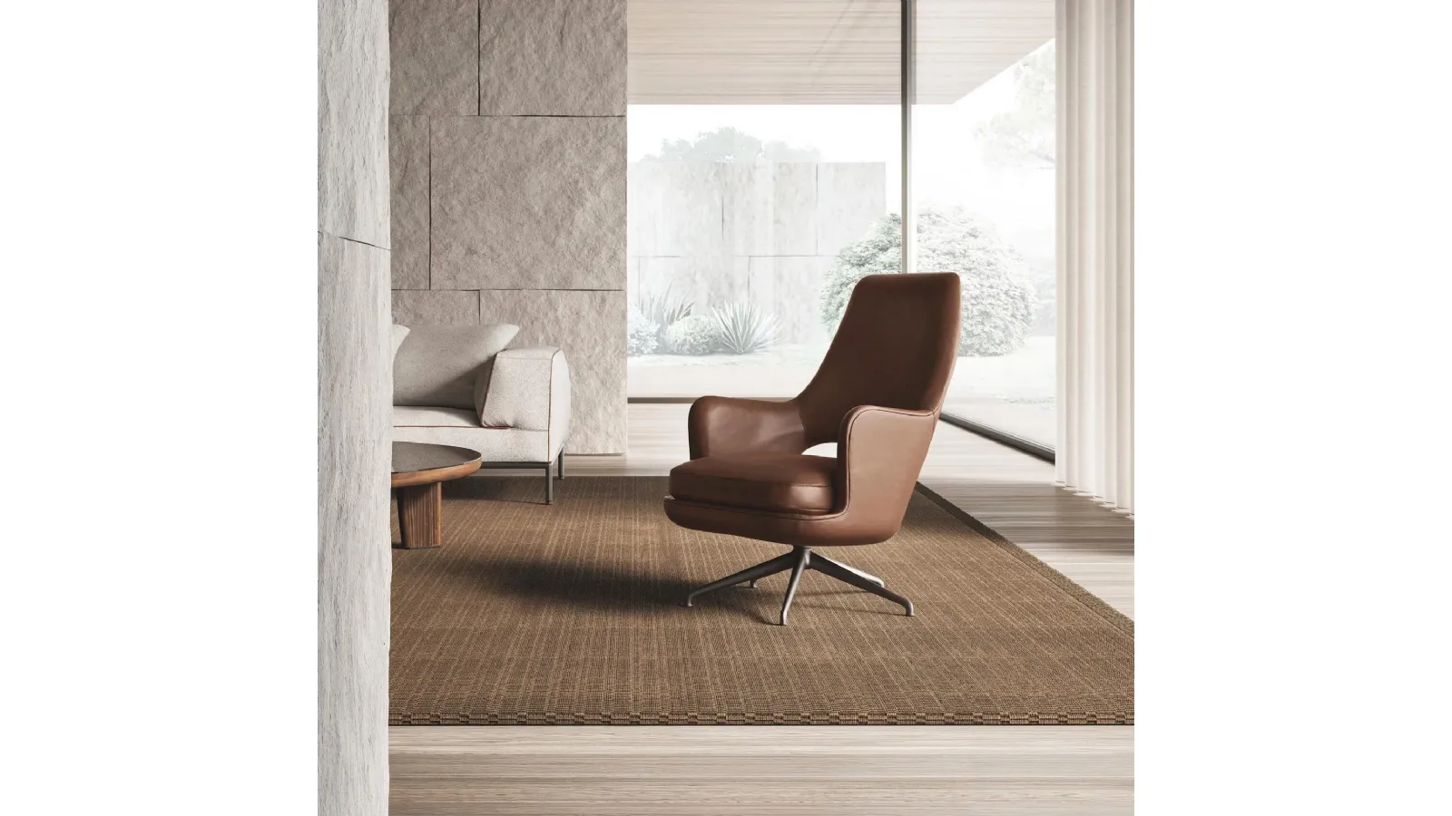 Eliseo leather armchair with a swivel aluminum base by Flexform