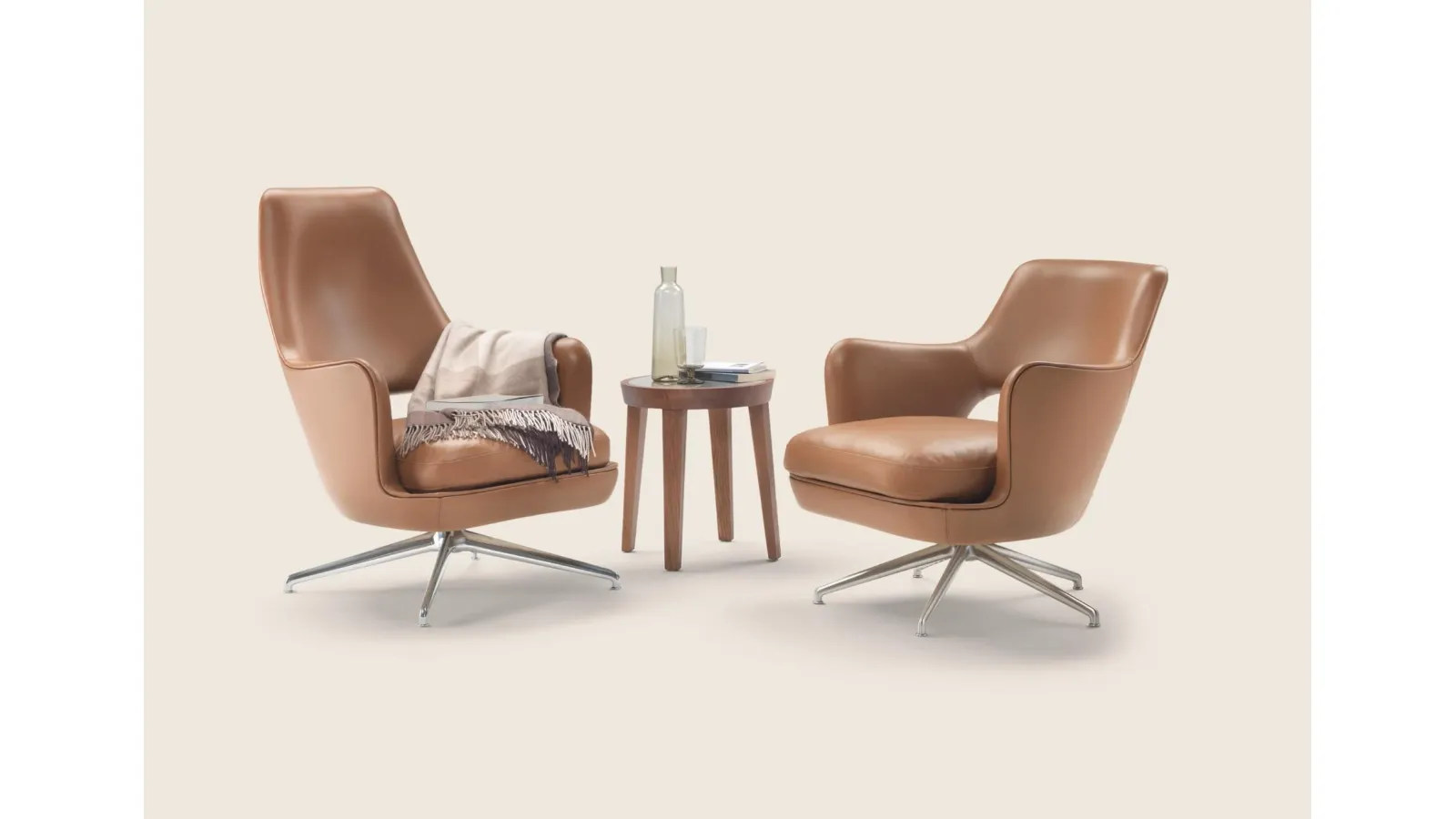 Eliseo leather armchair with swivel aluminum base by Flexform