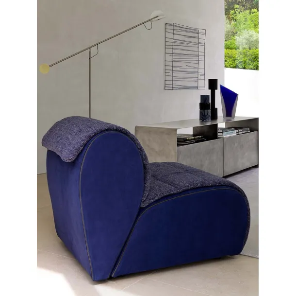 Flora armchair in fabric inspired by flower petals by Flou