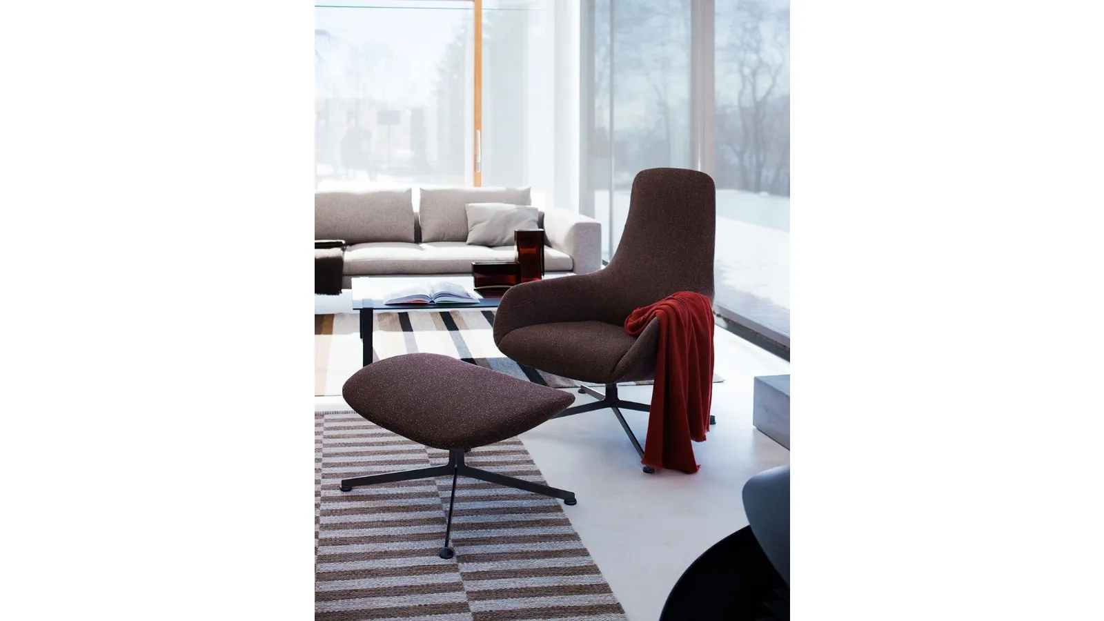 Kent swivel armchair in fabric with footrest by Zanotta