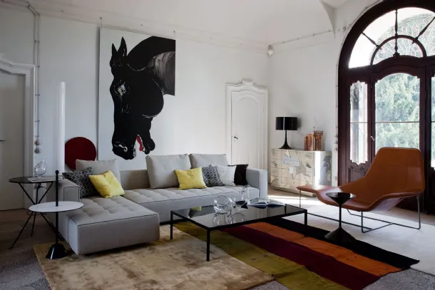 Lama armchair in leather with a painted steel frame by Zanotta