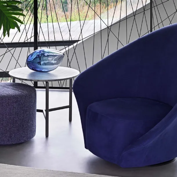 Flou Lilia fabric swivel armchair with a flower-like appearance and asymmetrical armrests