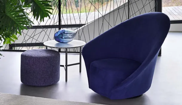 Flou Lilia fabric swivel armchair with a flower-like appearance and asymmetrical armrests
