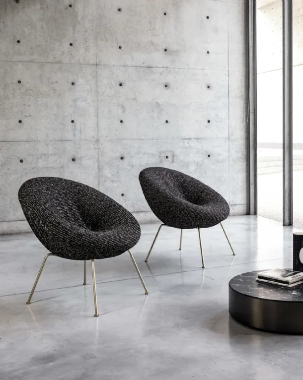 Nest Soft upholstered fabric designer armchair with gold-finish metal legs by Desirèe