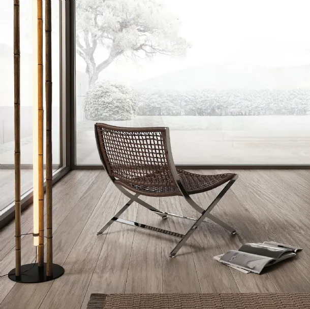 Peter armchair in woven leather with metal frame by Flexform