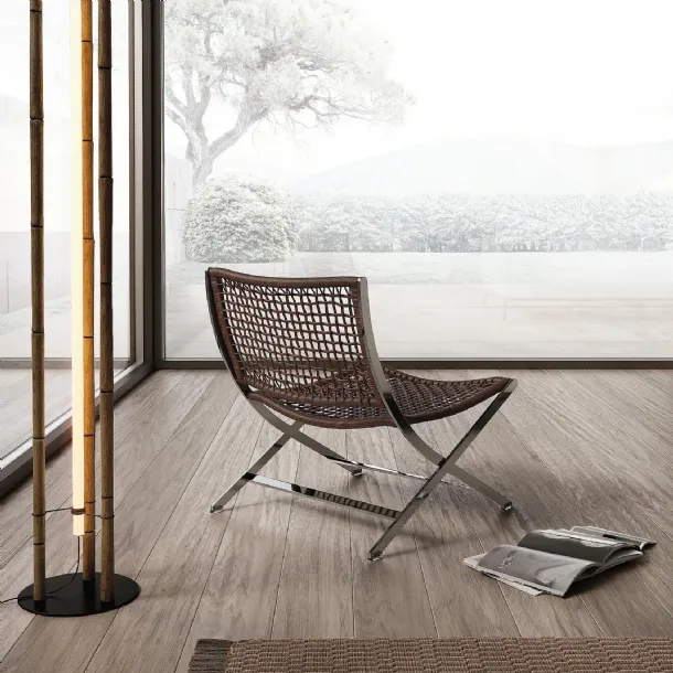 Peter armchair in woven leather with metal frame by Flexform