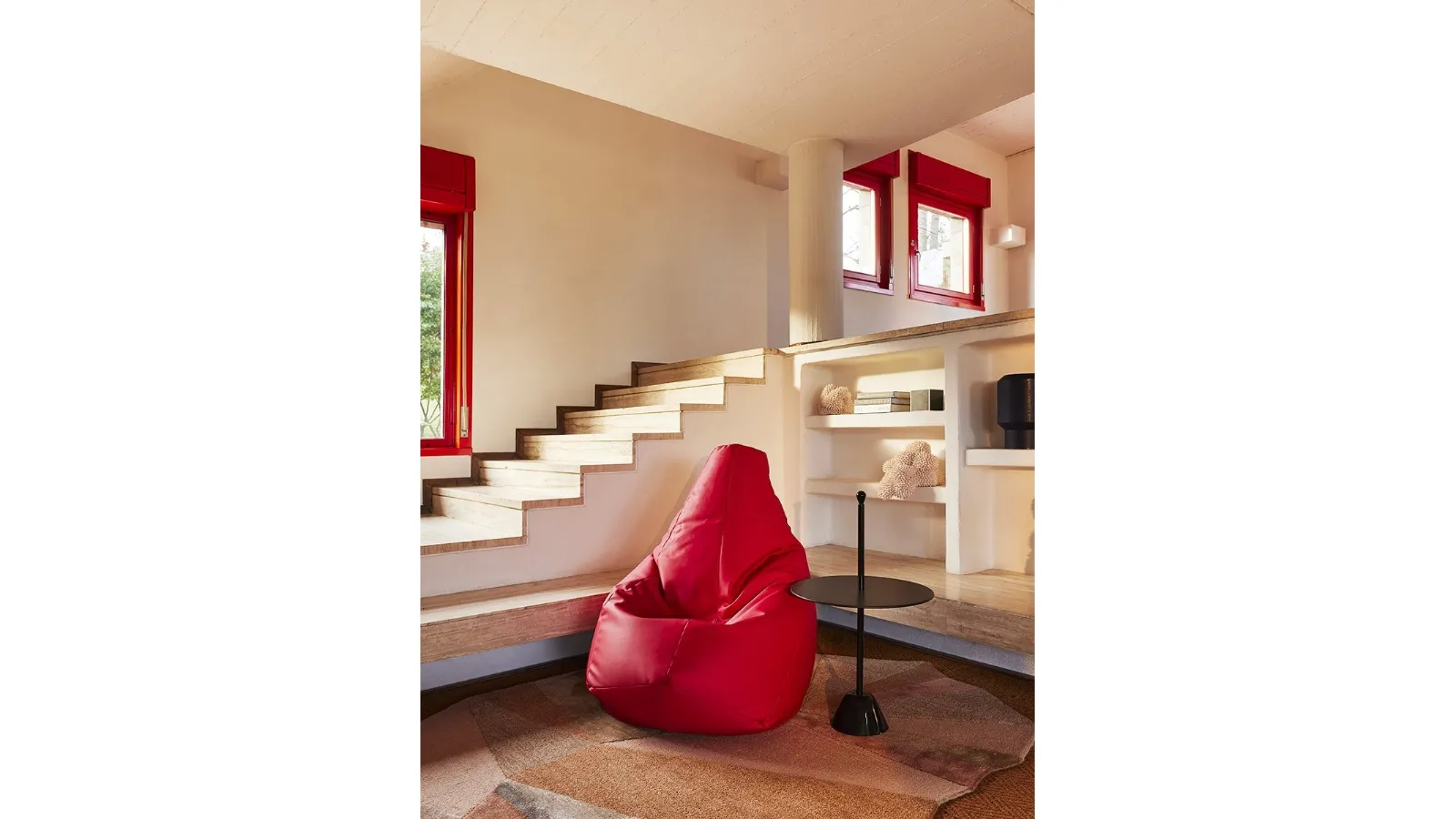 Anatomical armchair with a leather shell containing polystyrene balls Sacco by Zanotta