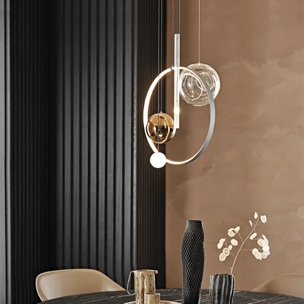 Biarritz pendant lamp by Cattelan Italia with a steel structure and transparent, bronze, and frosted borosilicate glass shades