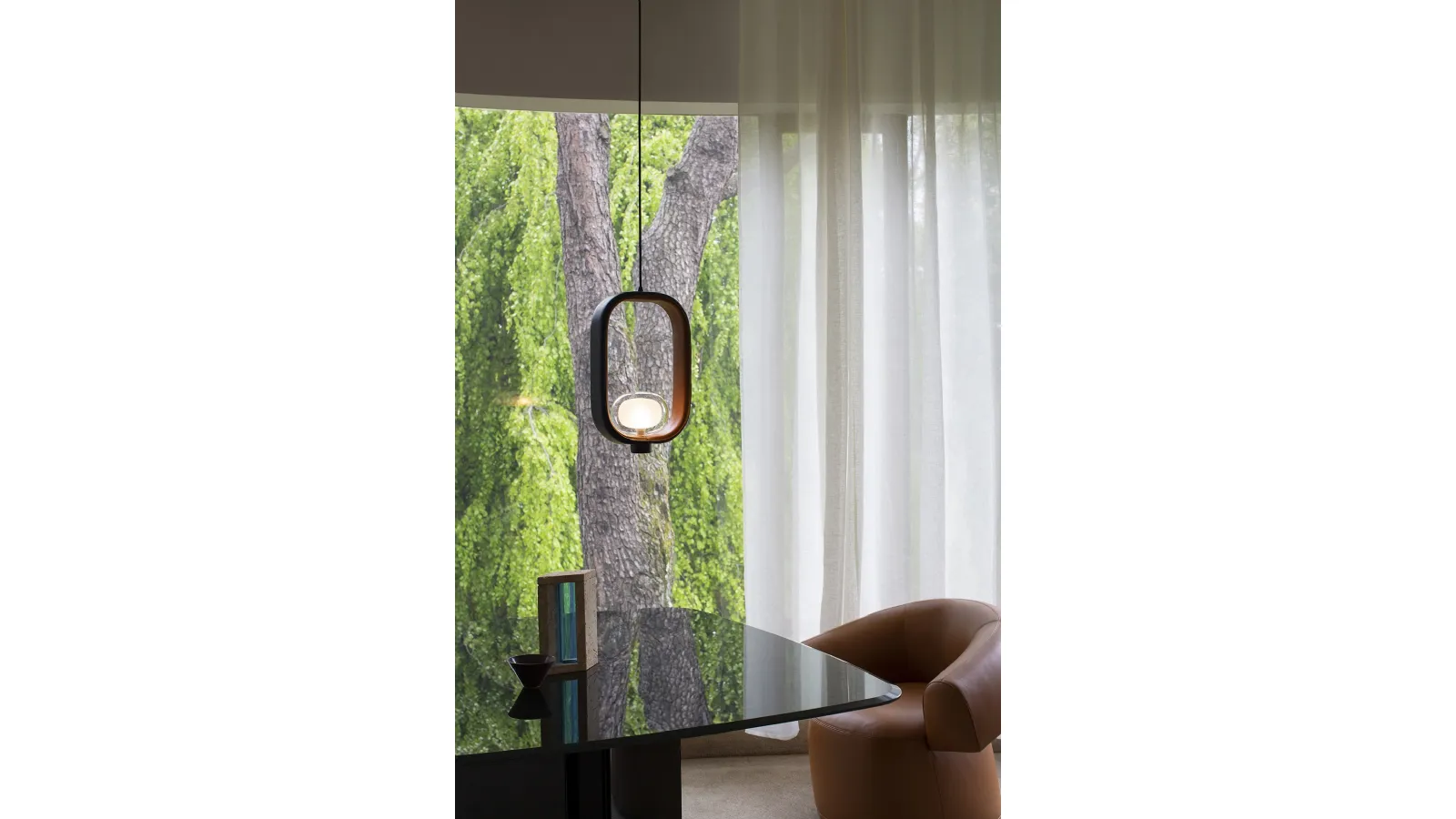 Leather-covered pendant lamp by Filipa de Tooy