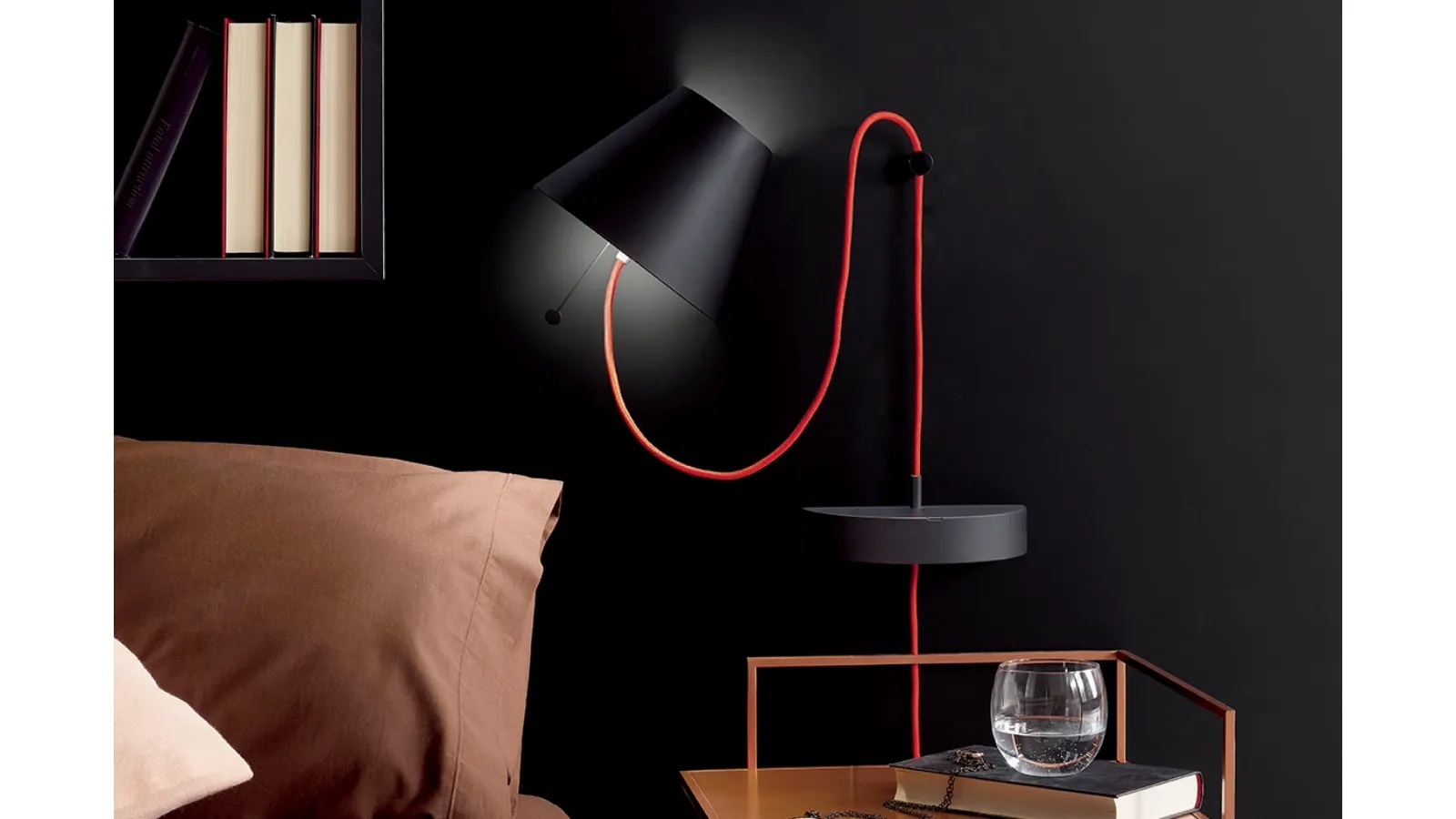 Lapilla magnetic wall lamp in metal with red fabric cable by Ronda Design