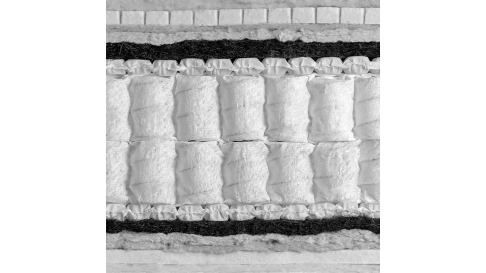 Organic Leonardo mattress composed of two layers of pocket springs and two layers of micro-springs by Flou