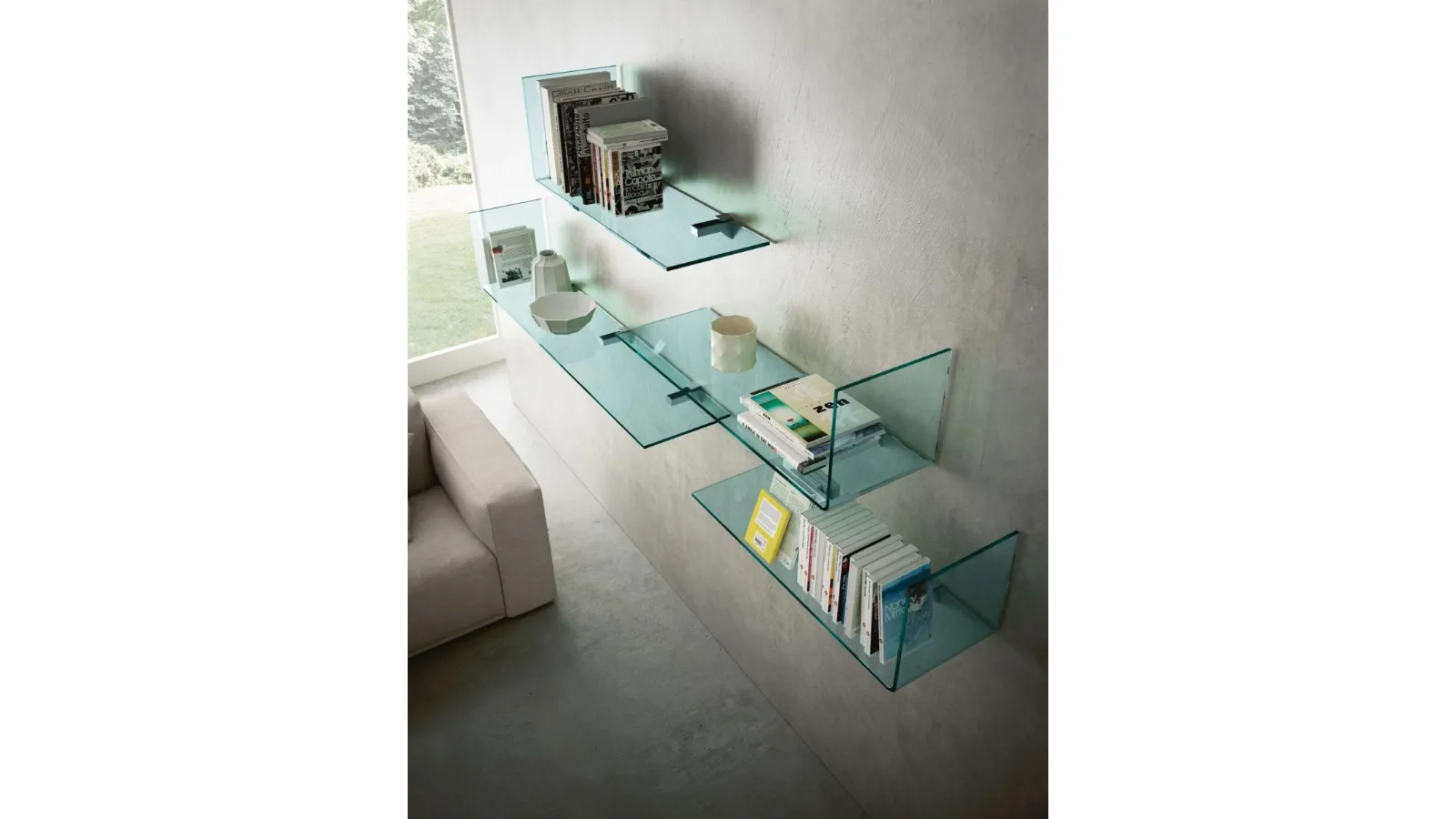 Rialto L bookcase made up of customizable transparent glass shelves by Fiam