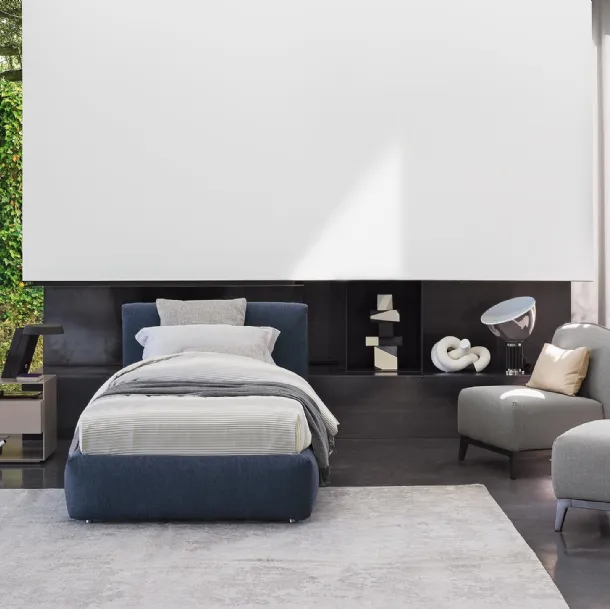 Modern and elegant single bed Merkurio in softly padded fabric by Flou