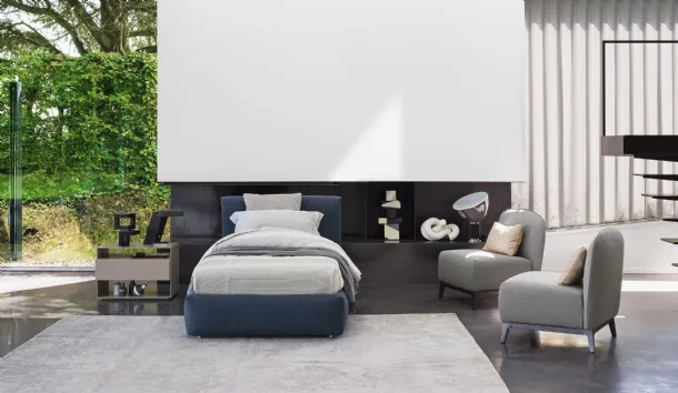 Modern and elegant single bed Merkurio in softly padded fabric by Flou