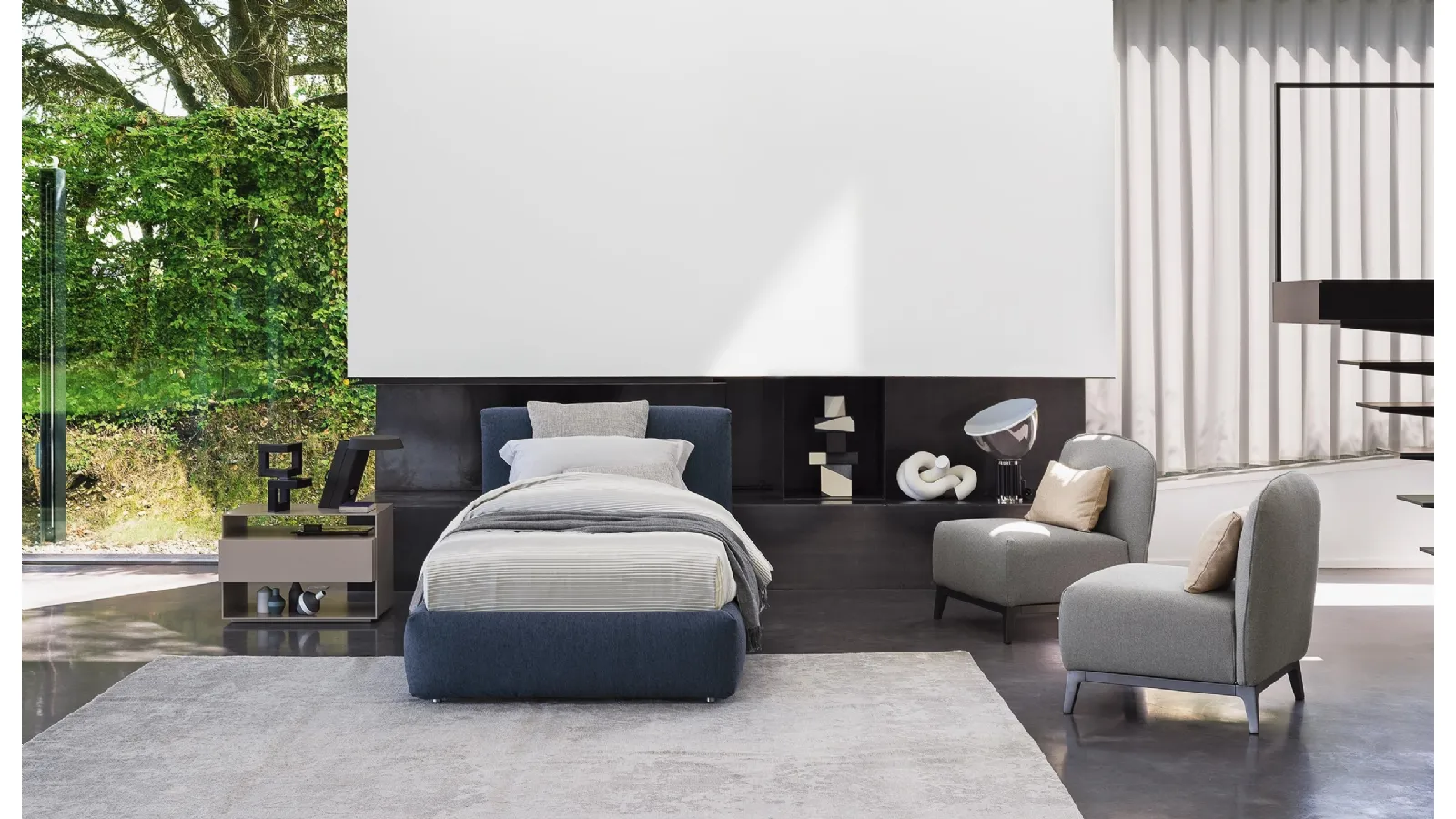 Modern and elegant single bed Merkurio in softly padded fabric by Flou
