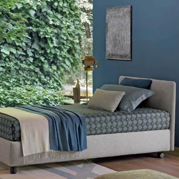 Single bed in Notturno fabric by Flou