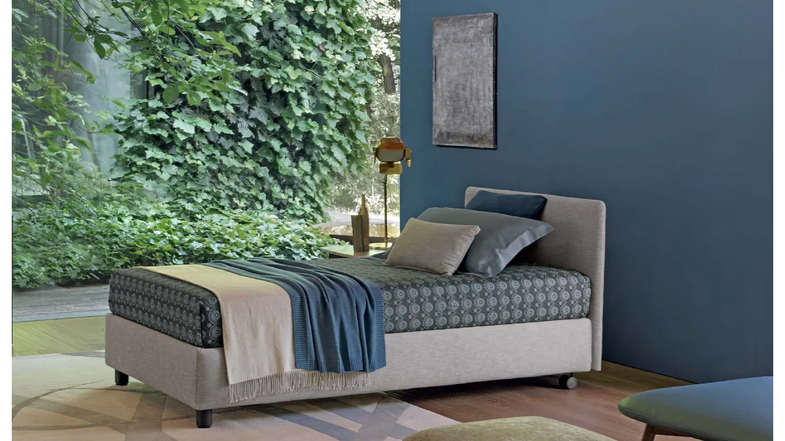 Single bed in Notturno fabric by Flou