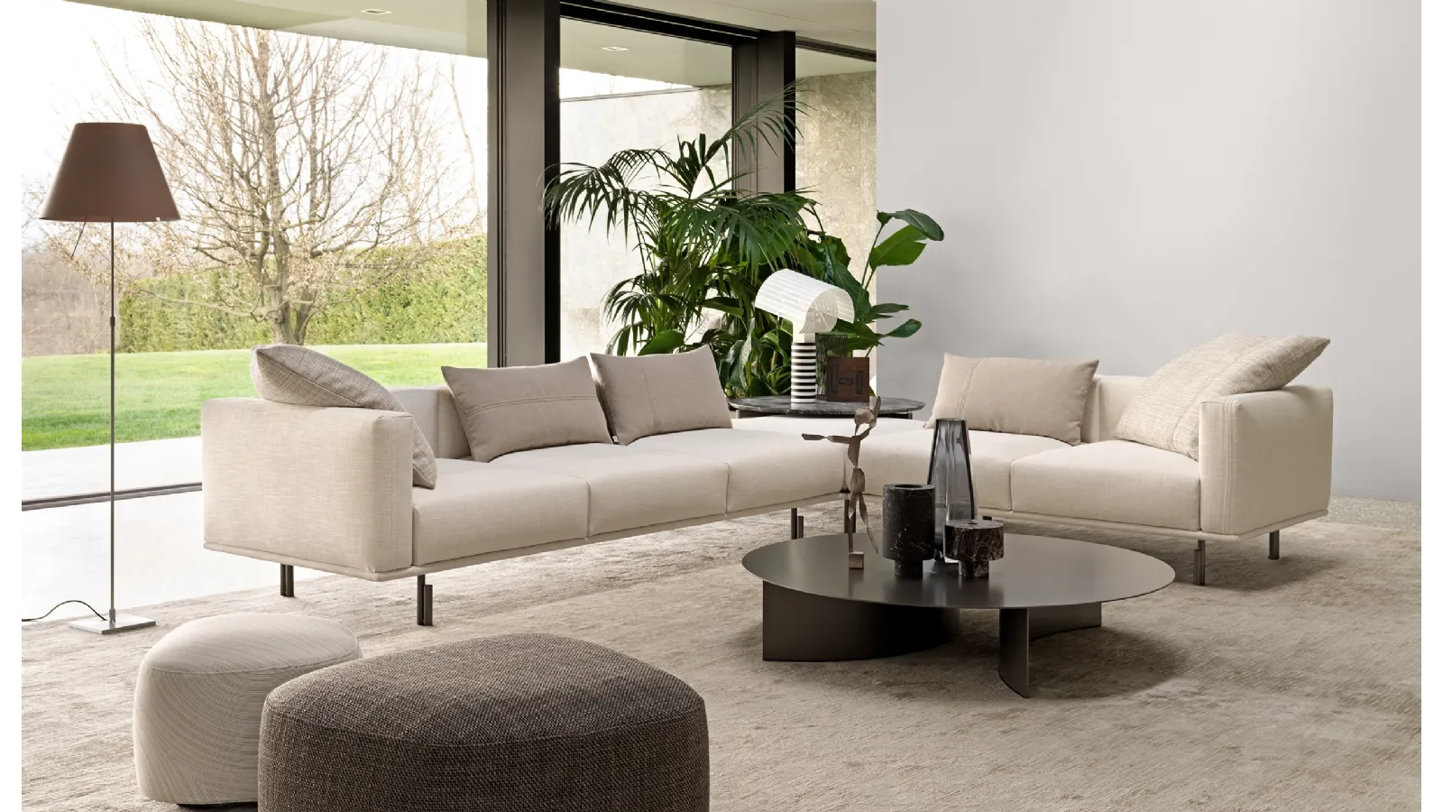 Binario modular corner sofa, with metal legs, feather cushions and adjustable backrest by Flou
