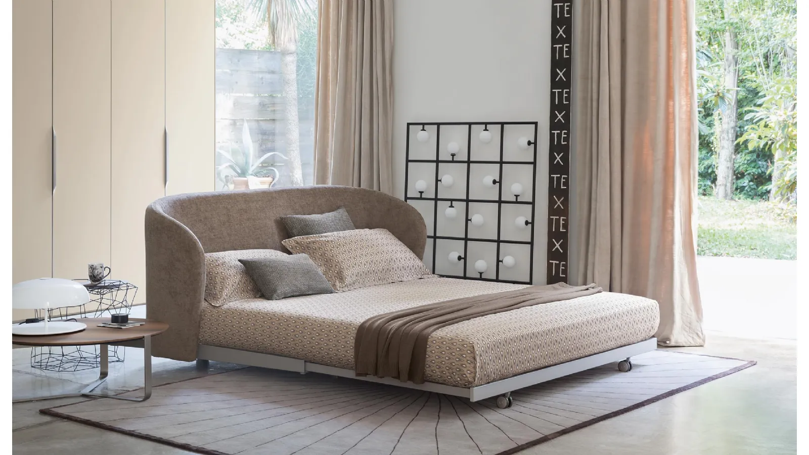 Céline fabric sofa bed by Flou