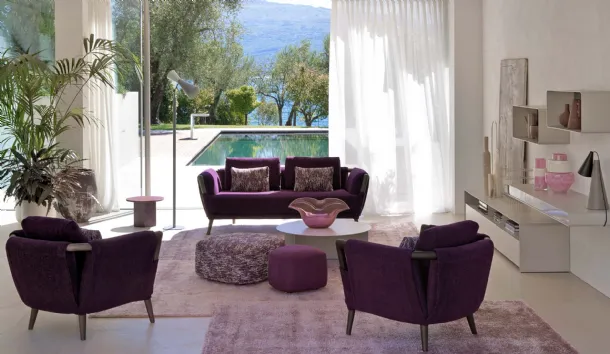 Linear sofa in amethyst-colored fabric and curved solid wood structure Gaudì by Flou