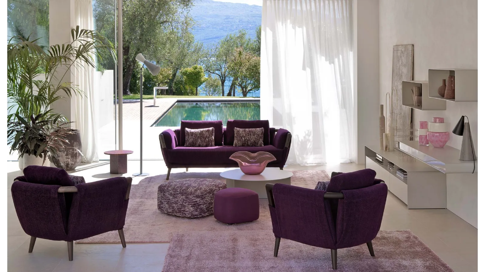 Linear sofa in amethyst-colored fabric and curved solid wood structure Gaudì by Flou