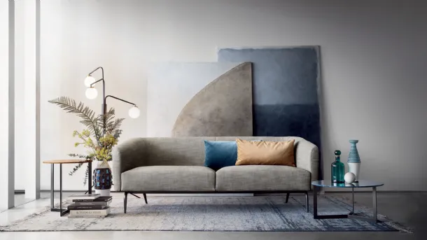 Kaiwa linear fabric sofa with metal legs by Lema