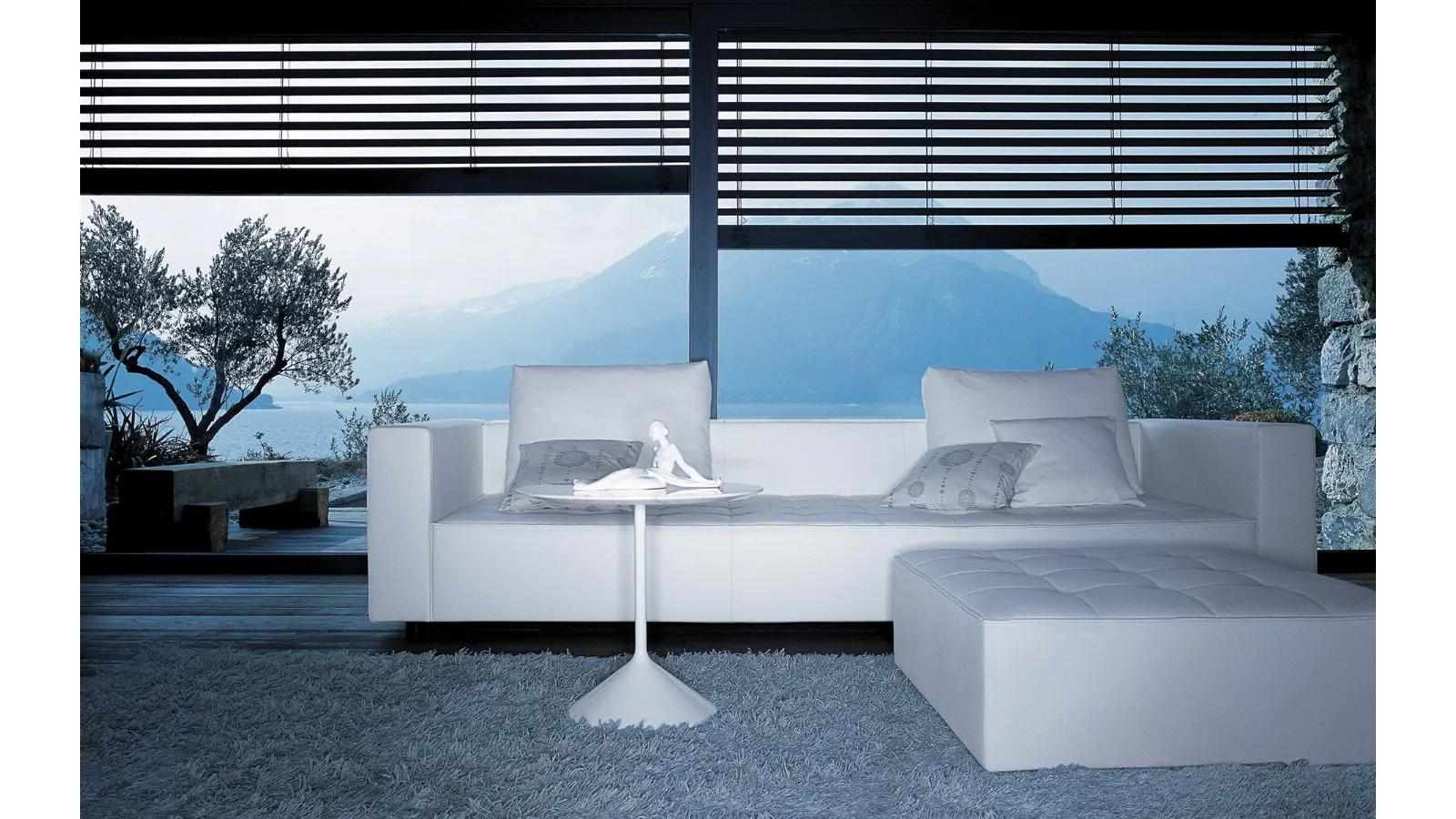 Kilt quilted fabric linear sofa by Zanotta