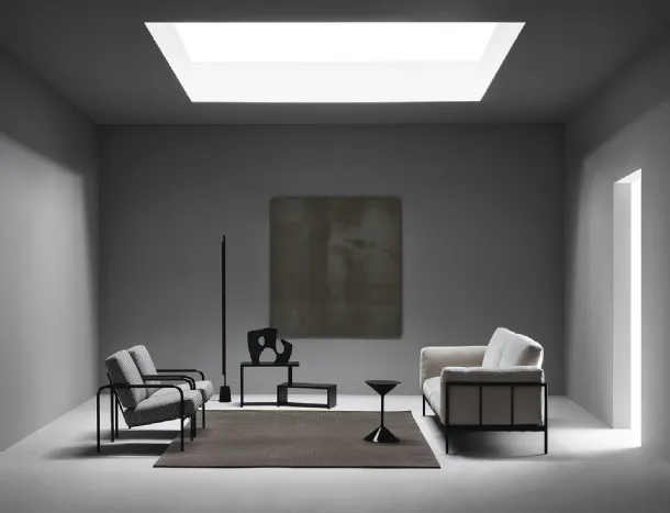 Linear fabric sofa with metal structure by Zanotta
